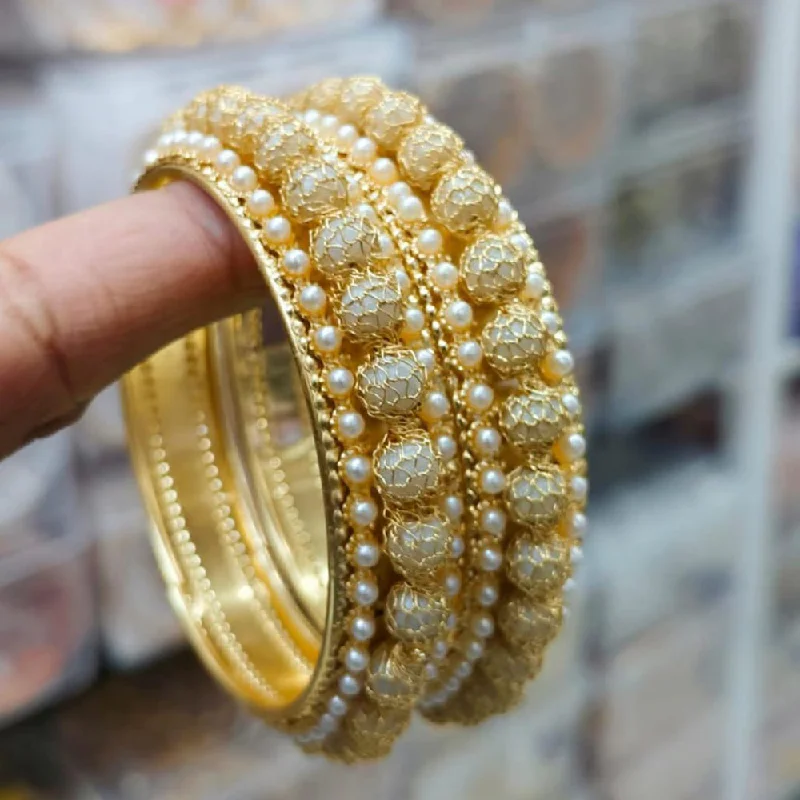 Simple Custom Wedding Bangles For Elegant Grooms-Pooja Bangles Gold Plated Pearl Bangles Set